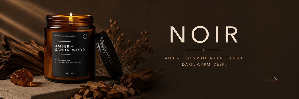 Noir – Amber glass and a crackling wood wick. Warm, grounded scents for the evening.